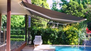 Folding arm awnings